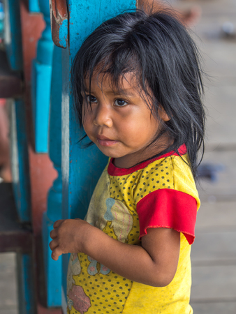 Tabatinga, Brazil - May 05, 2016: Portrait of a small girl â an inhabitant of the Leticiaのeditorial素材