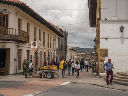 Tunja, Colombia - May 02, 2016: The inhabitants of the  town and the tourists walking down the streets of the town.のeditorial素材