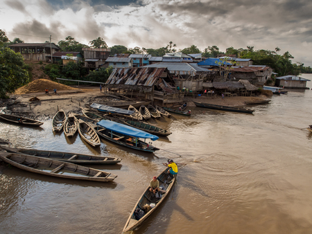 Amazon River, Peru - May 13, 2016: Traditional, indian  boats  on the bank of the riverのeditorial素材
