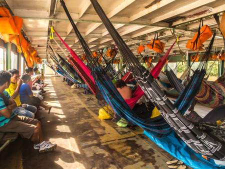 Amazon River, Peru - May 12, 2016: Beautiful, colorful hammocks on the cargo boat.のeditorial素材