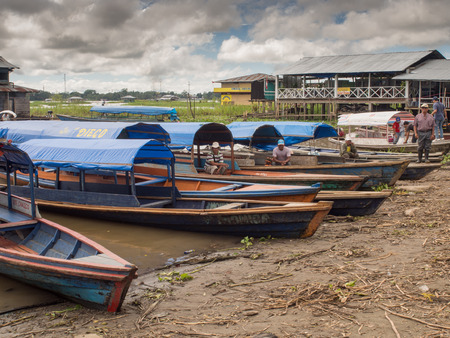 Santa Rosa, Peru - May 11, 2016: Traditional, indian  boats  on the bank of the riverのeditorial素材