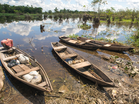 Santo Tomas, Peru  - May 17, 2016: Traditional, indian  boats  on the bank of the river