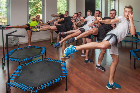 Otwock, Poland - September 10, 2016:  Fitness. Young people exercise  on small trampolinesのeditorial素材