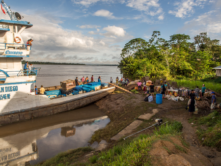 Amazon River, Peru - May 13, 2016: A passenger ferry and cargo at the port on the Amazon riverのeditorial素材