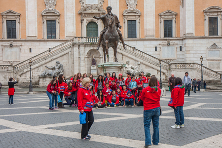 Rome, Italy - November 10, 2014: November 09, 2014:The Italian youths doing the picture on the square near the Forum Romanoのeditorial素材