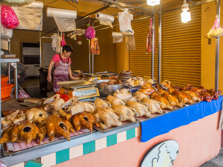Luodong, Taiwan - October 18, 2016: Typical local bazaar in Taiwan with roasted chicken and pork meatのeditorial素材