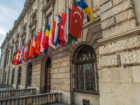 Vienna, Austria - May 23, 2017: Colourful flags on a wall of the Hofburg Imperial  Palace in Viennaのeditorial素材