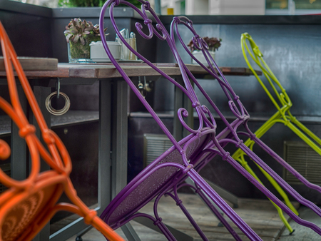 Vienna, - May 23, 2017: Summer Cafe Bar with colorful chairs  on a street of Viennaのeditorial素材