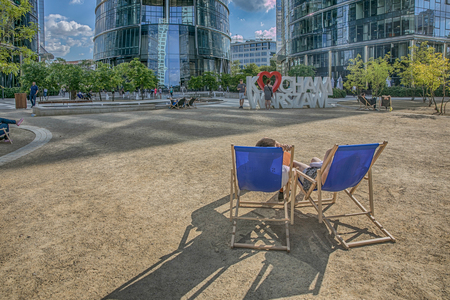 Warsaw, Poland - June 19, 2017: Resting in the moddle of Warsaw. New, glass skyscrapers in Warsaw. Love the Warsaw.のeditorial素材