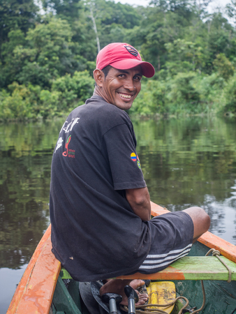 Jungle, Brazil - Dec 7, 2017:  Portrait of a man with a red skin in the Amazon  jungleのeditorial素材