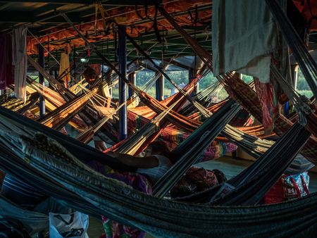 Amazon River, Peru - March 25, 2018: Beautiful, colorful hammocks on the cargo boatのeditorial素材