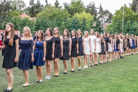 Jozefow, Poland - June 21, 2017: Polonaise dancing on the last day of the school year in one of the Polish secondary schools.のeditorial素材