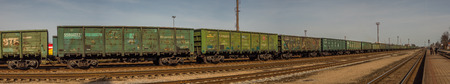 KÅajpeda, Lithuania - April 07, 2018: Various colorful wagons of a cargo train on the train station in KÅajpedaのeditorial素材