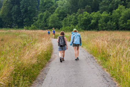 Young people on the mountain trail. Table mountains. GÃ³ry StoÅowe, Poland.の写真素材