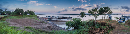 Caballococha, Peru - Sep 23, 2018: Cargo boat in the port on the Amazon river near Caballococha village. Boat cannot go to the town as the level of water is very lowのeditorial素材