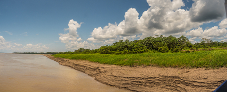 Panoramic view for the Amazon river from  the deck of a cargo boat during the low water season.