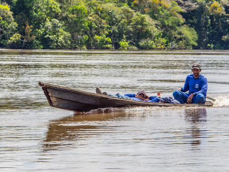 Amazon River, Brazil: - May 07, 2016: Small boat with locals on the Amazon Riverのeditorial素材