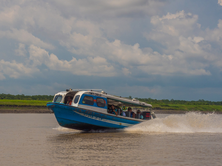 Amazon River, Brazil: - Sep 15, 018: Speed boat with locals on the Amazon River. Local traffic from Tabatinga to Benjamin Constant. Latin America.のeditorial素材