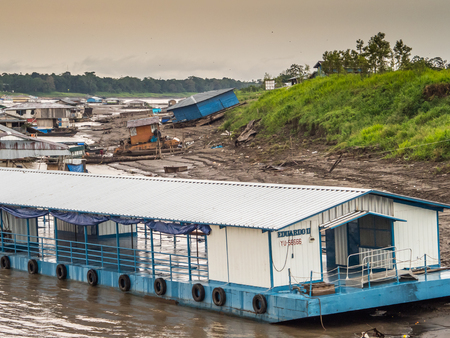 Santa Rosa Peru - September 22, 2018:  Floating houses stuck on the bank of the Amazon river during low water season.のeditorial素材