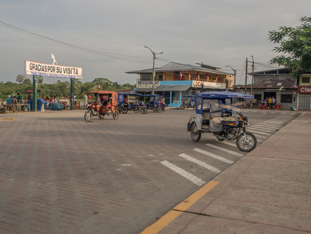 Caballococha, Peru - Dec 11, 2017: Small town with the port on bank of the Amazon river on the way from Santa Rosa to Iquitosのeditorial素材