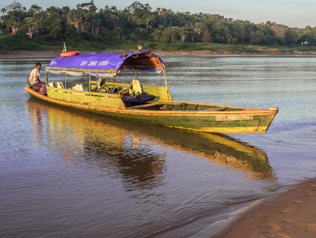 Amazon River, Brazil: - Sep 15, 2018: Small boat with locals on the Amazon River. Local traffic. Latin America.のeditorial素材
