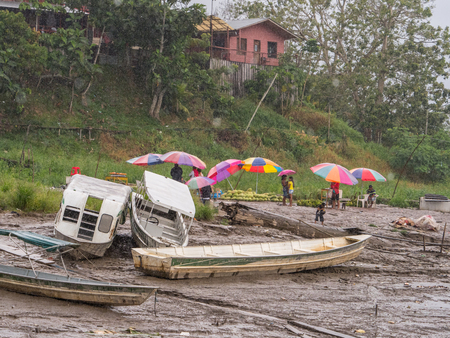 Tabatinga, Brazil - September 22, 2018:  Boats stuck on the bank of the Amazon river during low water season.のeditorial素材