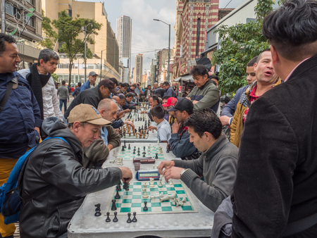 Bogota, Colombia - November 23, 2018: Colombian men are playing chesson on  the street of Bogota.のeditorial素材