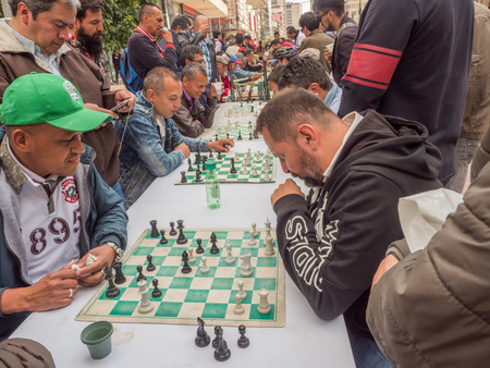 Bogota, Colombia - November 23, 2018: Colombian men are playing chesson on  the street of Bogota.のeditorial素材