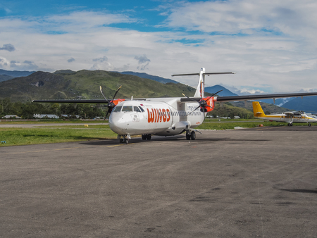 Wamena, Indonesia - January 22, 2015: A small plane at the local airport in Wamena. West Papua, Asia.のeditorial素材