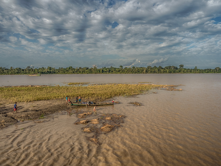 Amazon River, Peru - December 04 , 2018:  During the low water season, cultivation of rice appear in the middle of the Amazon River. South Americaのeditorial素材
