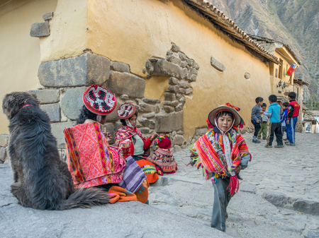Ollantaytambo, Peru - May 20, 2016: Kids in colorful, folk costumes in the Pisac marketのeditorial素材