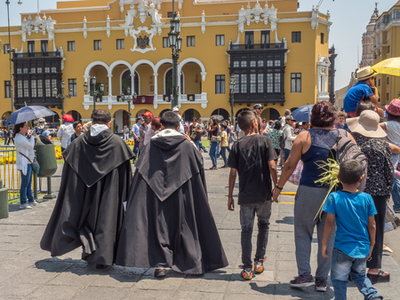 Lima, Peru - March 29, 2018: Priests on the street of Lima before Easter time. Good Friday.  Plaza de Armas, Peru, South America. Latin Americaのeditorial素材