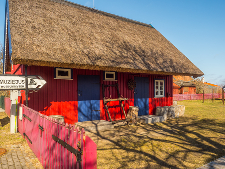 Nida, Lithuania - April 06, 2018: Nida Fisherman's Ethnographic  on the headland, National Park Curonian Spit, A nature reserve with forests and a long sandy coast, according to a legend made by a giant.のeditorial素材