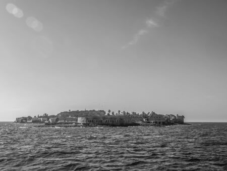 View of island Goree with fort and Dakar city visible in the background. GorÃ©e Island. Dakar, Senegal. Africa. Ãle de GorÃ©e.の写真素材