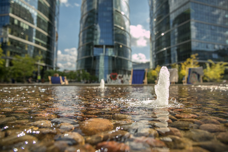 Warsaw, Poland - June 19, 2017: Resting in the moddle of Warsaw. New, glass skyscrapers in Warsaw. Love the Warsaw.のeditorial素材