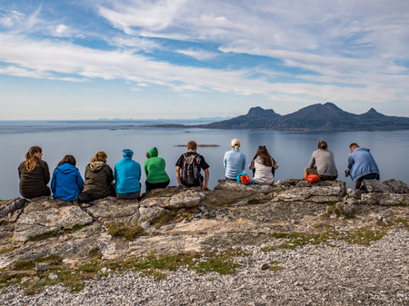 Hikers on  the Keiservarden. Keiservarden is a mountain plateau on top of Veten hill near BodÃ¸, Nordland in northern Norway. Vaagovand Lake. Norwy. Europeのeditorial素材