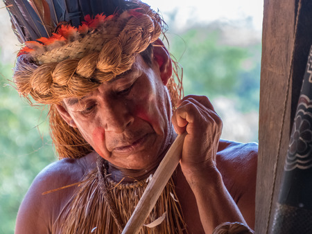 Iquitos, Peru- Sep 26, 2018: Portrait of Yagua Tribe Senior Indian in his local costume. Latin America. Yagua, Yahuasのeditorial素材