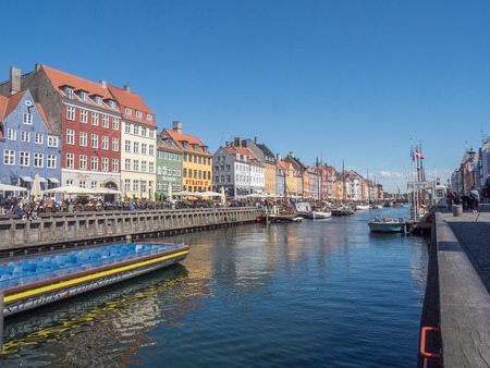Nyhavn (New Harbour), Copenhagen, Denmark - 14 JMay 2019: Panoramic view of Nyhavn pier with color buildings, ships, yachts and other boats in the Old Town of Copenhagen, Denmark, Europeのeditorial素材