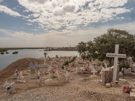 Joal-Fadiout, Senegal - January, 26, 2019: View of Mixed Muslim-Christian Cemetery. Joal-Fadiouth town and commune in the ThiÃ¨s Region at the end of the Petite CÃ´te of Senegal. Africa.のeditorial素材