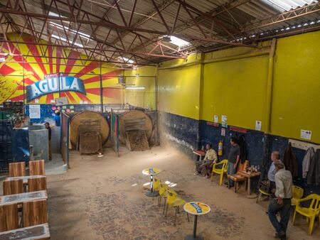 Bogota, Colombia - Septemebr 12, 2019: Colombian men are playing tejo game in the local tejo club.Tejo, also known, to a lesser degree, as turmeque, is a traditional throwing sport in Colombia.のeditorial素材