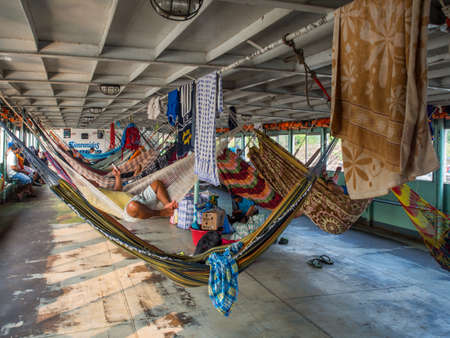 Amazon River, Peru - Sep 12, 2017: Beautiful, colorful hammocks on the cargo boat.のeditorial素材