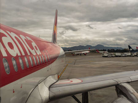 Bogota, Colombia - September, 2019: Row of the windows on the plane of Colombian airline Avianca at Bogota airport.  South America, Latin Americaのeditorial素材