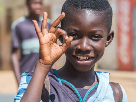 Senegal, Africa - January 24, 2019: Portrait of a black boy in blue uniform. Senegal Africa.のeditorial素材