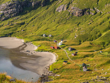 View of the village from the trail to Helvetestinden from Bunes beach in Norway