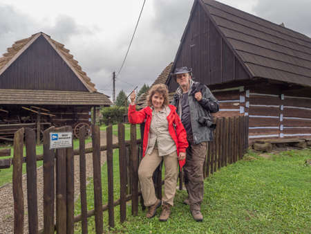 Zyndranowa, Poland - August 13, 2017: Tourists in front of a typical Lemko house in the Lemko Culture Museumのeditorial素材