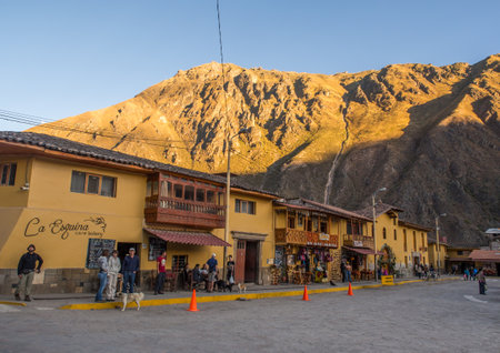 Ollantaytambo, Peru - May 20, 2016: Main square in Ollantaytambo, a town on the road to the treasures of Inca with a view for Andes mountain.のeditorial素材