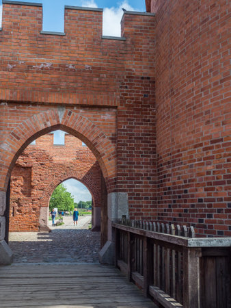 Malbork, Poland - May 22 2019: Entrance gate to the Teutonic castle in Malbork (Marienburg) in...