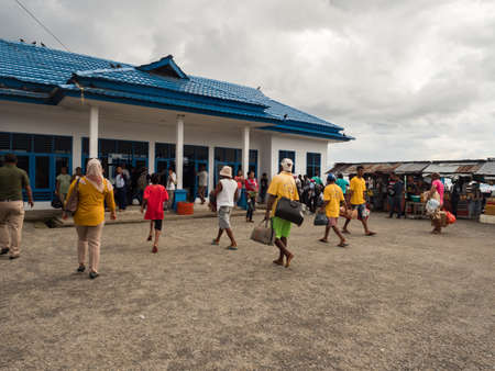 Ambon, Indonesia - February 15, 2018: Passengers in Tulehu Port, Ambon Island, Maluku, Indonesia, Asiaのeditorial素材