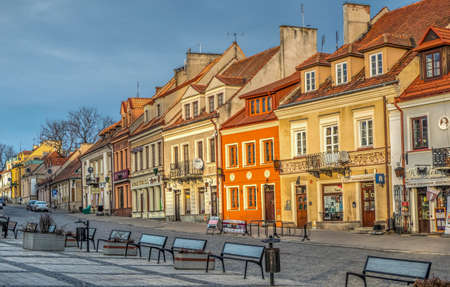 Sandomierz, Poland - February 17, 2020: Colorful tenement houses and glass benches on the market square in Sandomierz, one of the oldest and historically most important cities in Poland.のeditorial素材