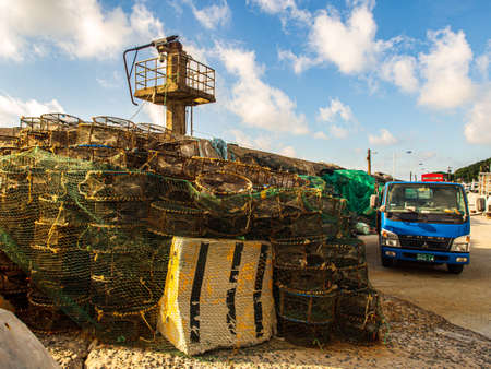 Cages for catching crabs and shrimps in the fishing port of Fuji.のeditorial素材